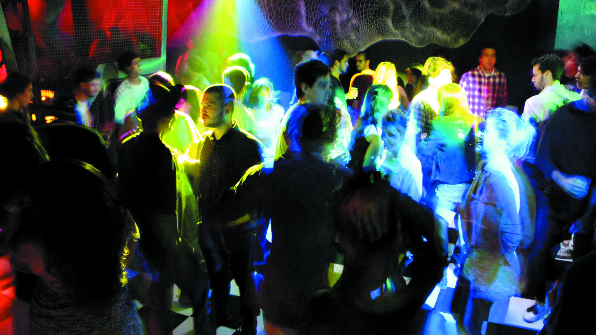 Fosfobox Rio de Janeiro underground dance floor with industrial decor and blue lighting